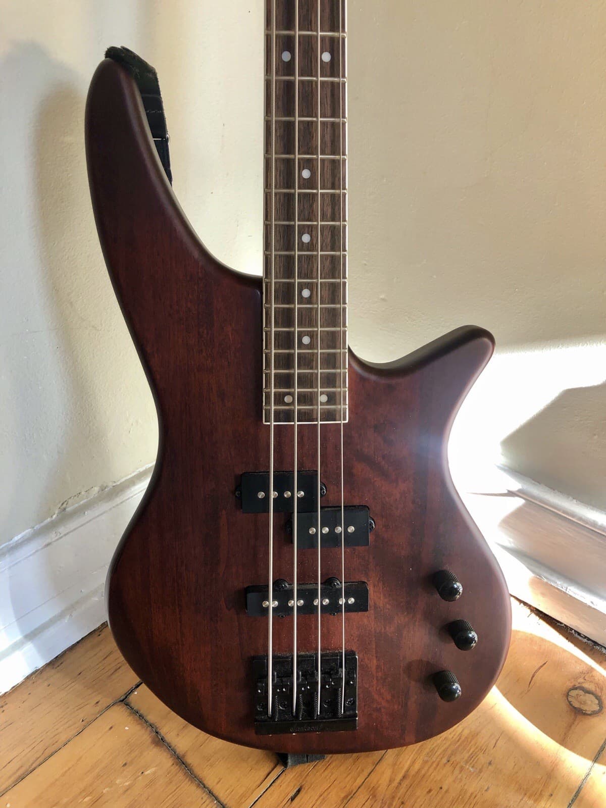 Jackson Bass Guitar - JS Series Walnut Stain. With Black Fender Strap.