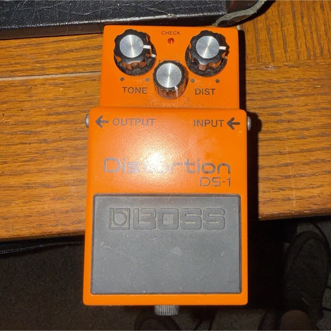 Schecter Custom S Diamond Series 6-String and amp with a boss distortion pedal