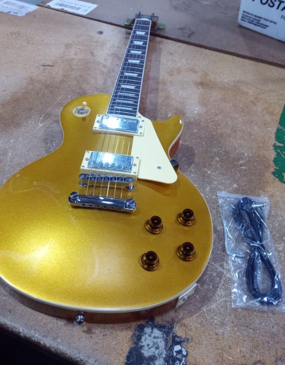 USED LP GOLD electric guitar Solid Mahogany Body Rosewood Fingerboard only one