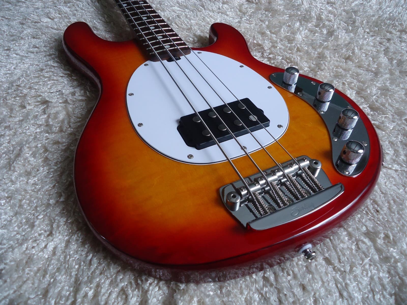 Sterling by Music Man Stingray Ray34 Heritage Cherry Flame Top Bass Guitar.