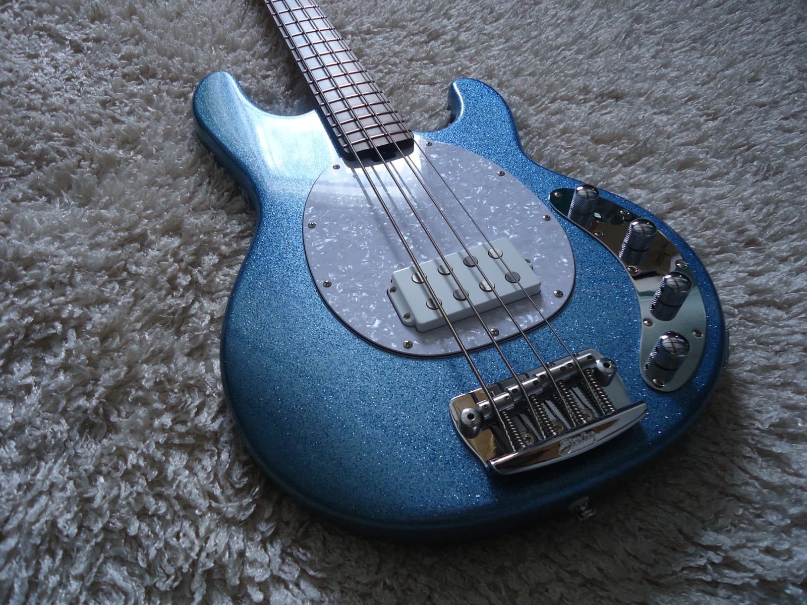 Sterling by Music Man StingRay Ray34 Blue Sparkle Bass Guitar.