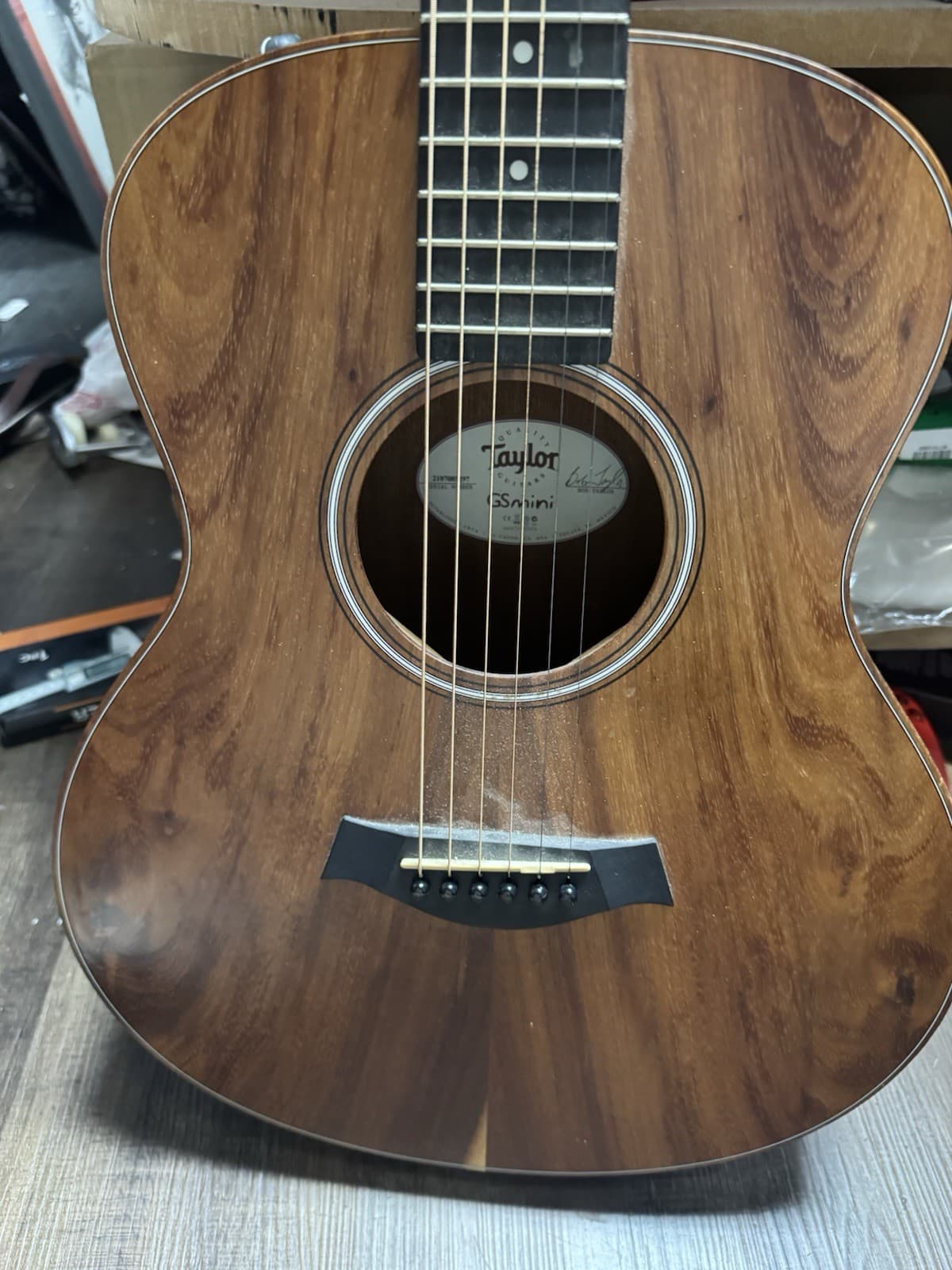 Preowned Acoustic Taylor Mini Guitar With Taylor Carrying Case
