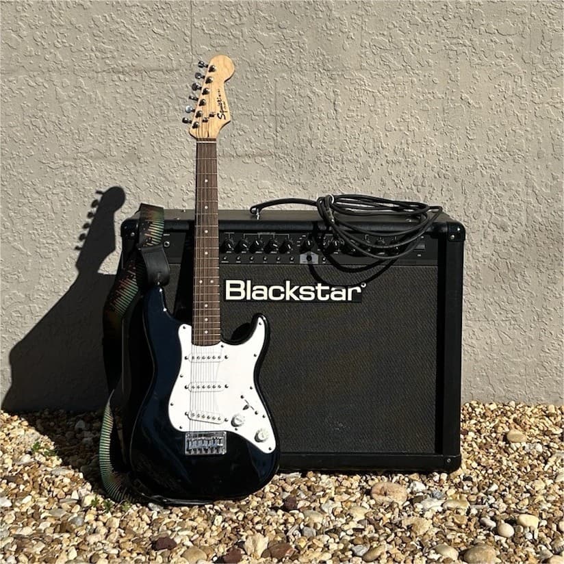 Squier Mini Electric Guitar Black Solid 6 String with Blackstar Amplifier