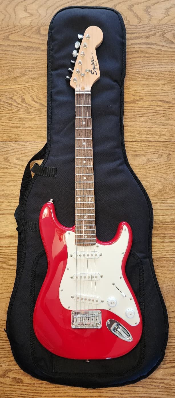 FENDER RED MINI SQUIER ELECTRIC GUITAR WITH GIG BAG
