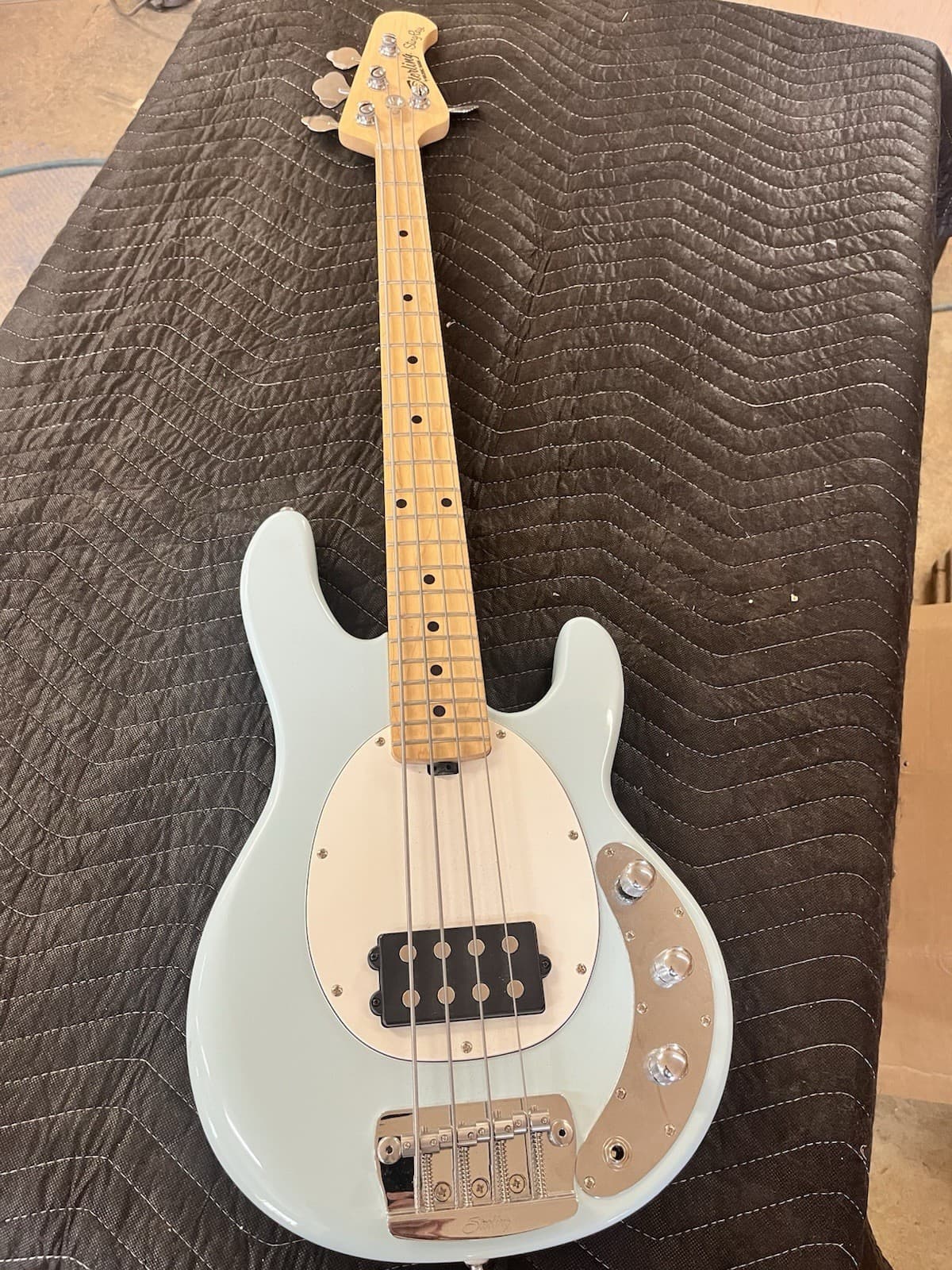 Sterling by Music Man StingRay RaySS4 Daphne Blue Short Scale Bass Guitar.