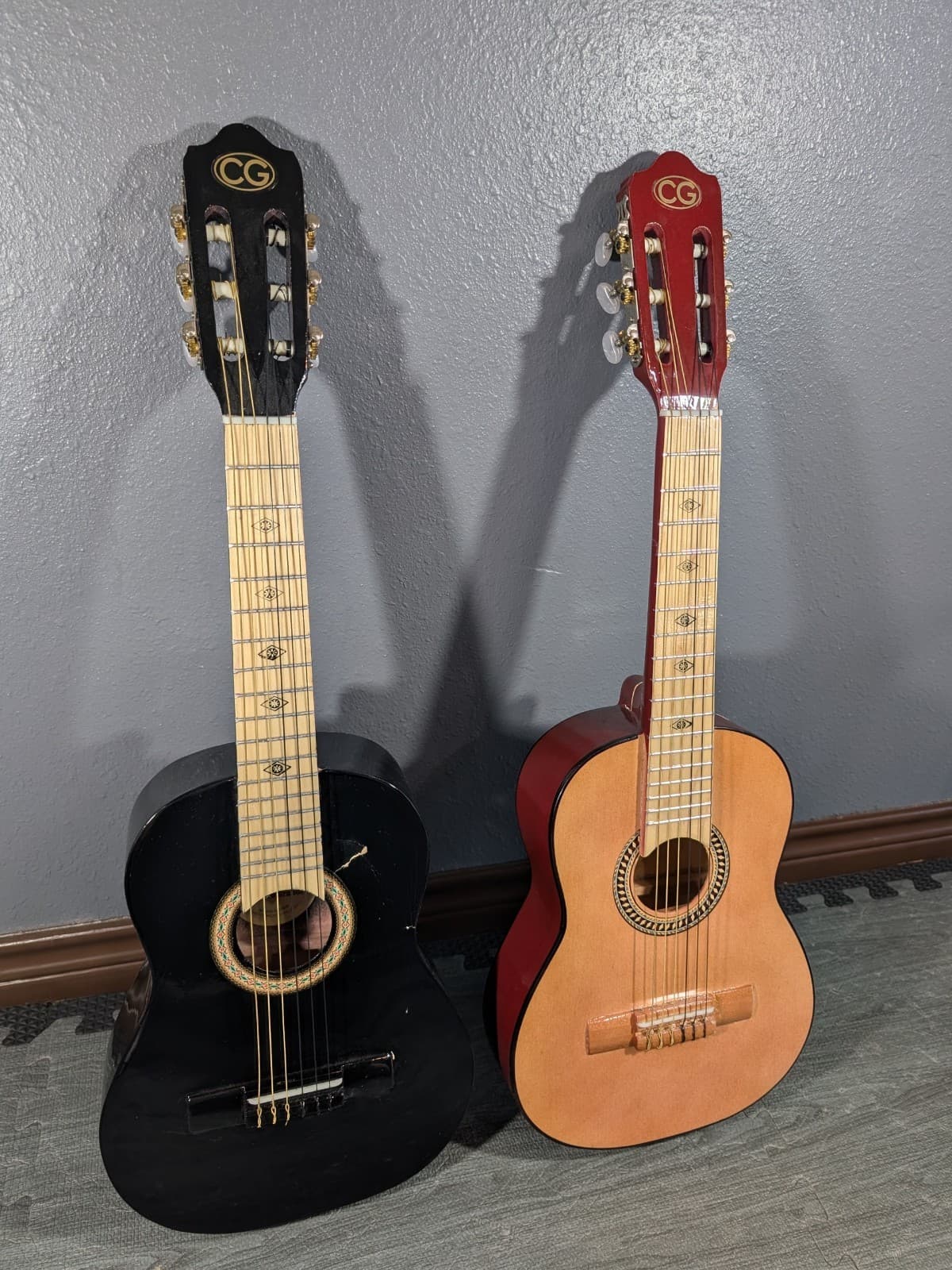 2 Kids Guitar Damaged, both are cracked and need repairs, read description