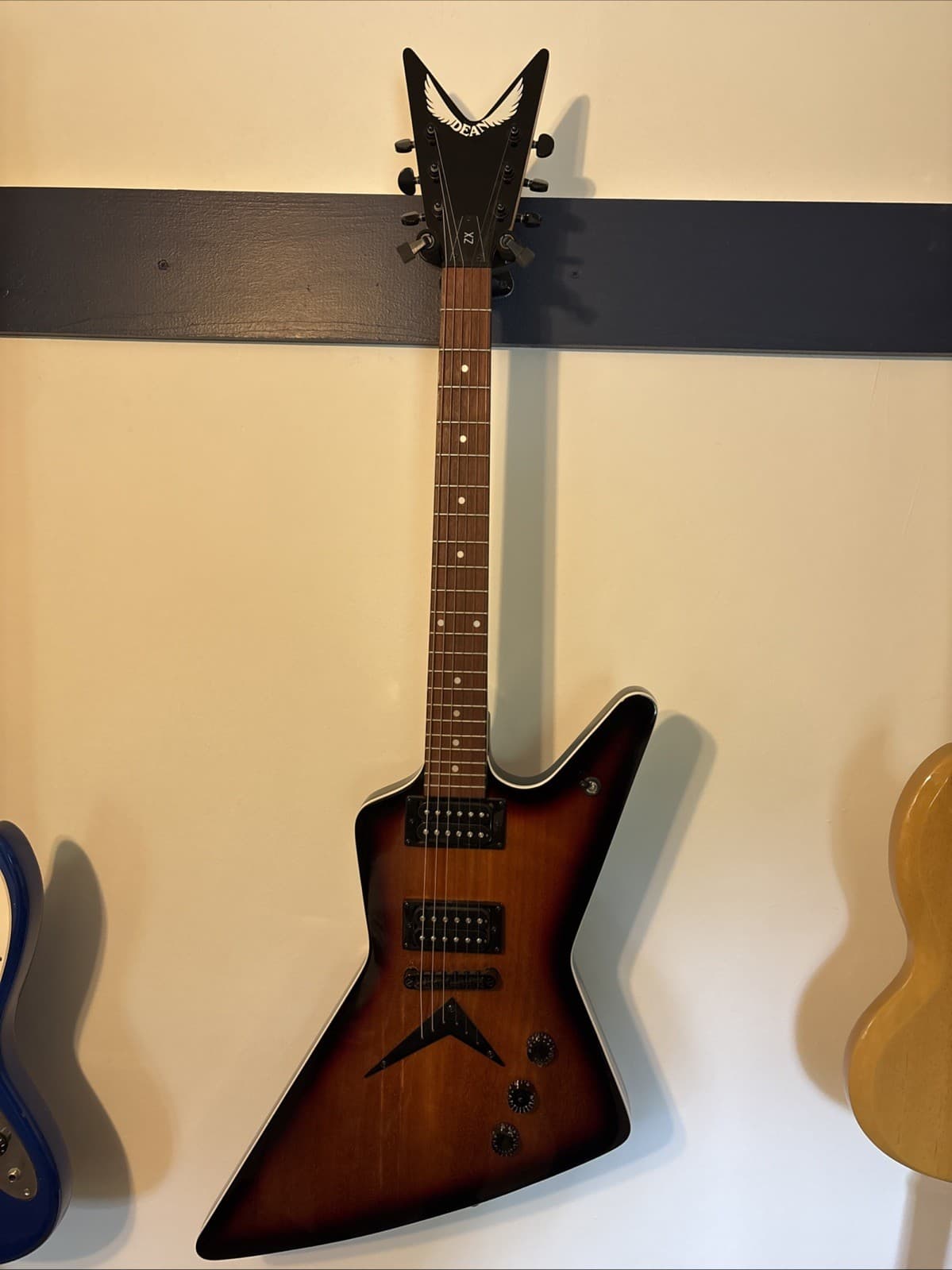 Dean ZX explorer style electric guitar Brazillaburst