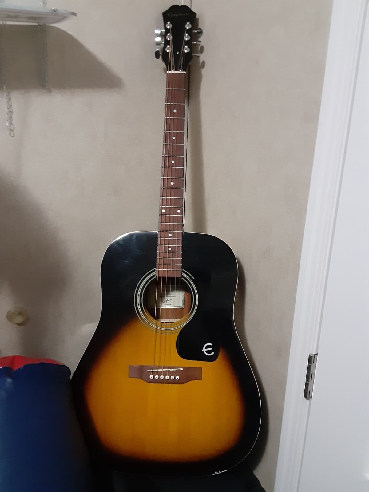 acoustic guitar epiphone, used, near perfect condition, brown, black, and ta