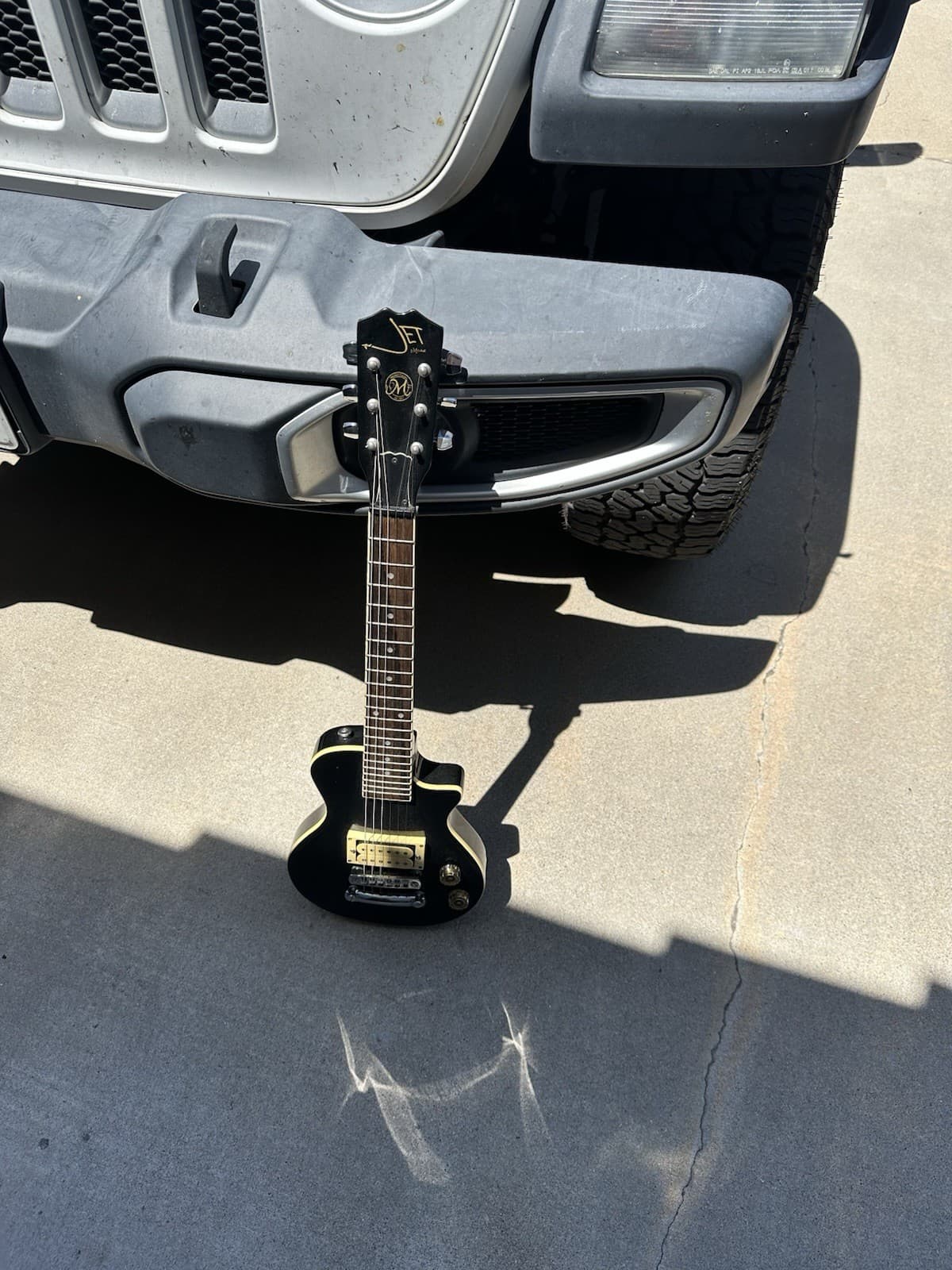 Vintage Mitchell Jet Mini 3/4 size electric travel guitar in black