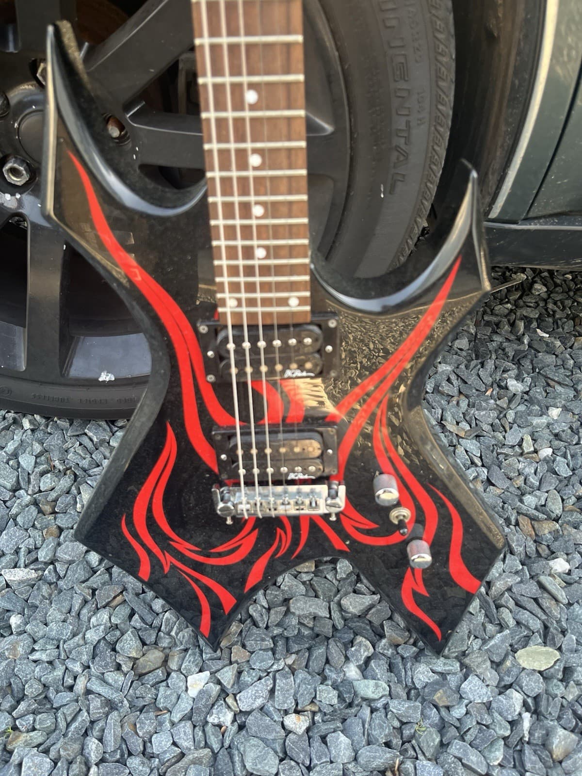 B.C. Rich Electric Guitar Black with Red Graphics Solid 6 String Right-Handed