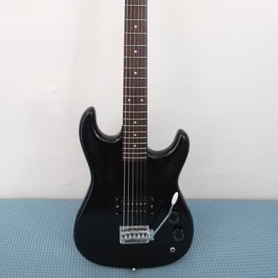 Vintage 1980s 1990s Cort Teisco K Mart Brand Mini Black Metal Head Shredder Travel Kids Guitar Youth Junior 3/4 Travel Office Tour Bus Backstage Warm Up Guitar Loud Punchy Tone Fun!
